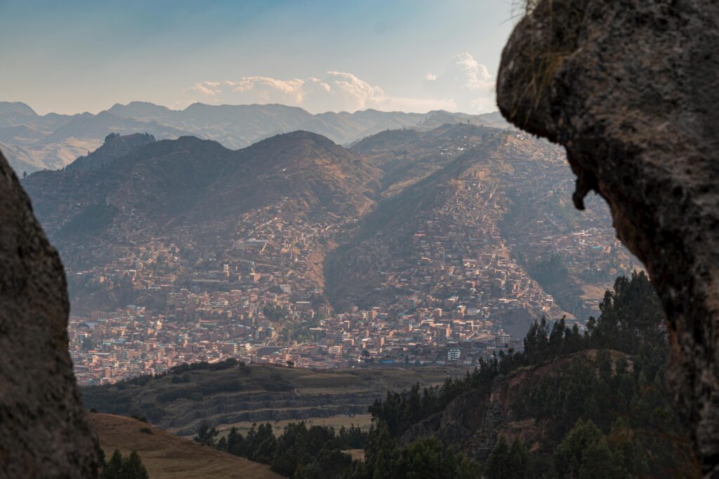 pexels-photo-29935223-29935223 A breathtaking view of Cusco city surrounded by Andes mountains from Sacsayhuamán ruins.